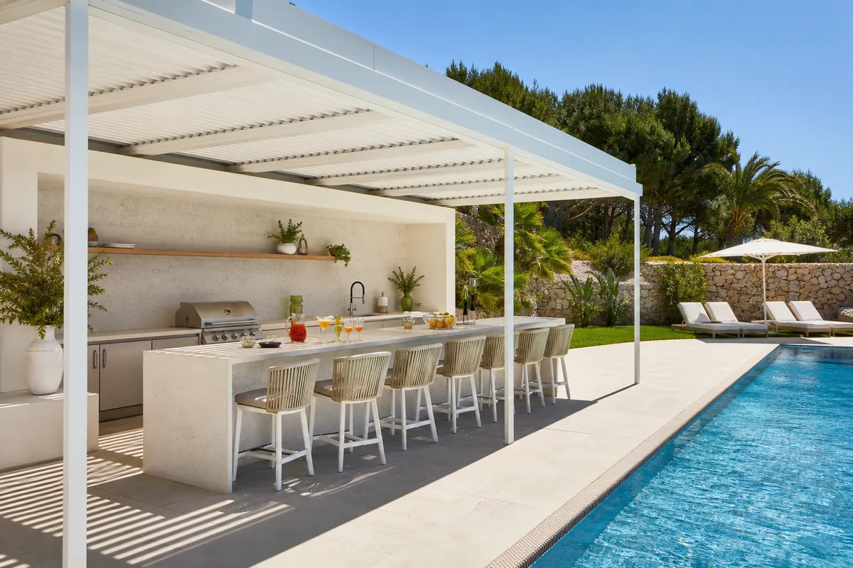 Poolside outdoor kitchen and bar pergola