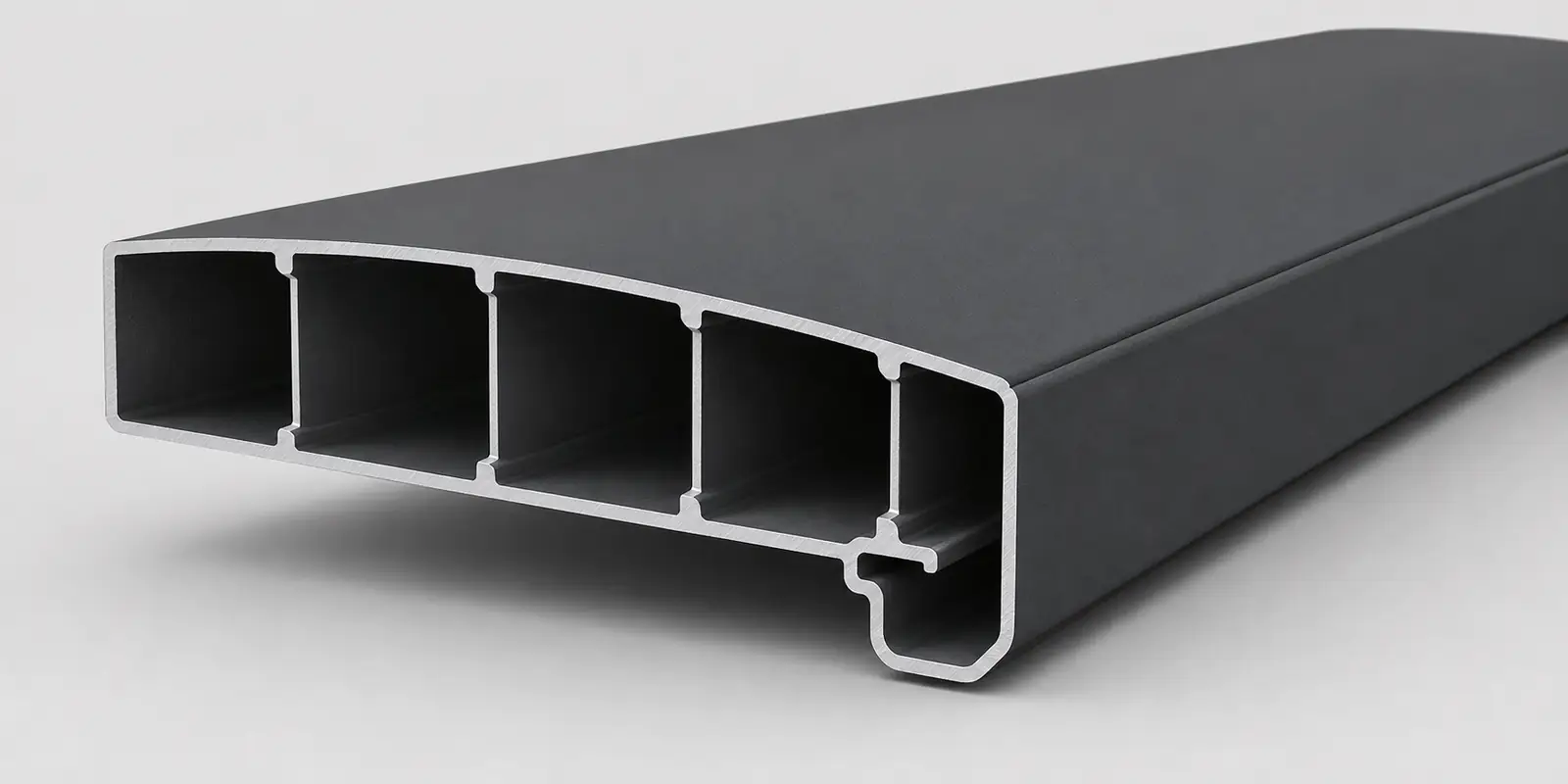 Hollow aluminum louver blade cross section showing internal ribs and drainage channel